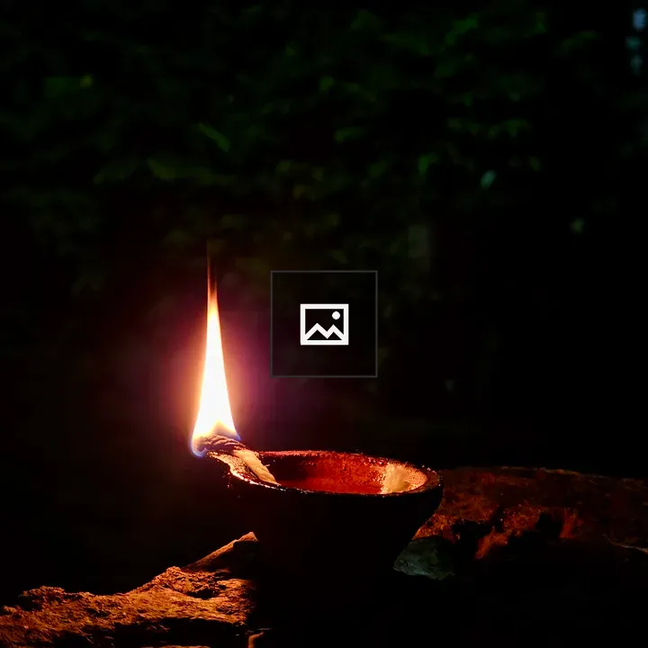 Clay oil lamp at night