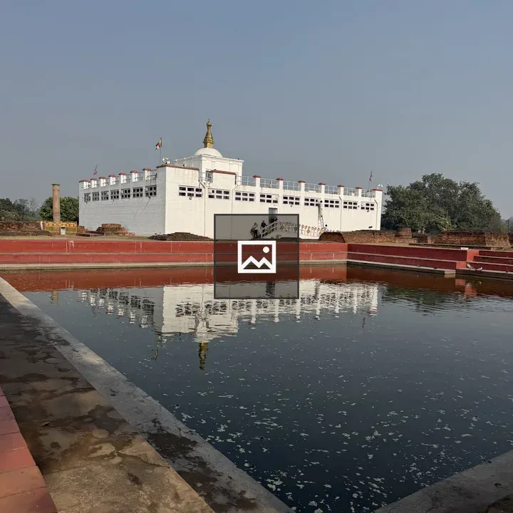 White building with gold spire