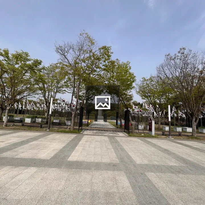 Park Entrance Pathway with Monument