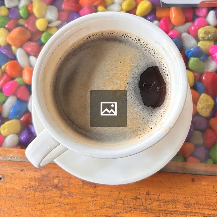 Coffee cup on wooden surface