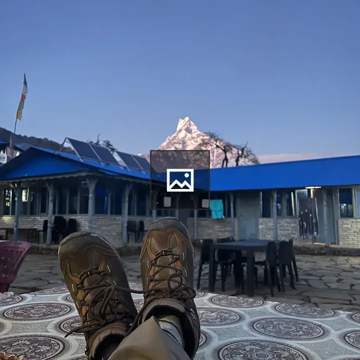 Hiking Boots Resting on Bench