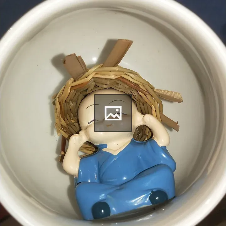 Ceramic Figurine in White Bowl