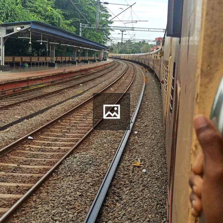 Train at the Station Tracks