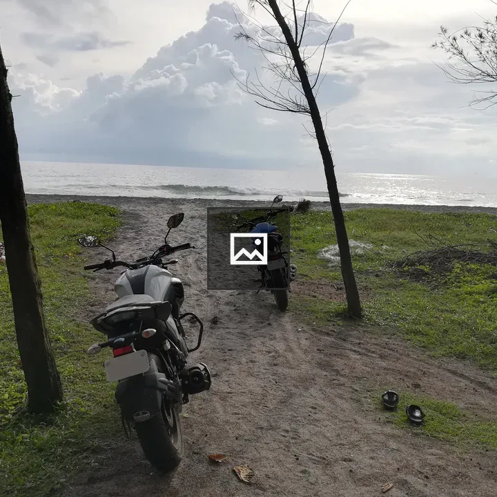 Two motorcycles on the beach