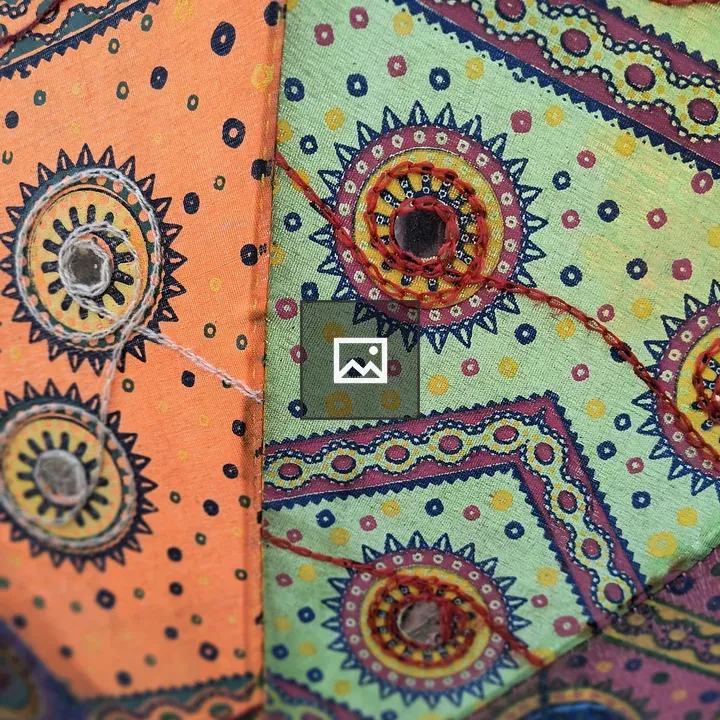 Colorful embroidered fabric close-up
