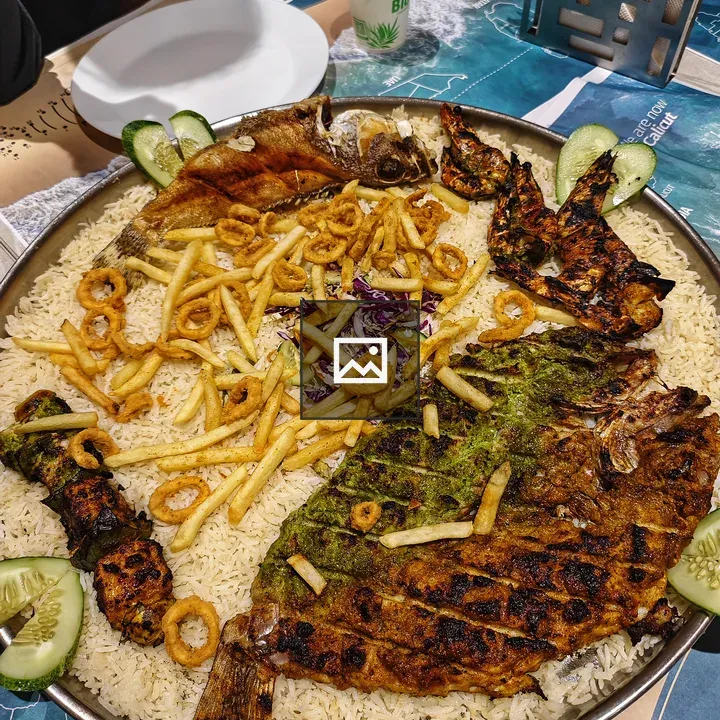 Dish of grilled fish with white rice
