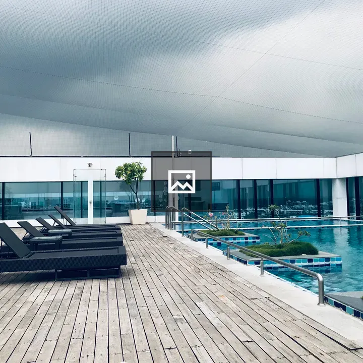 Poolside lounger with shade