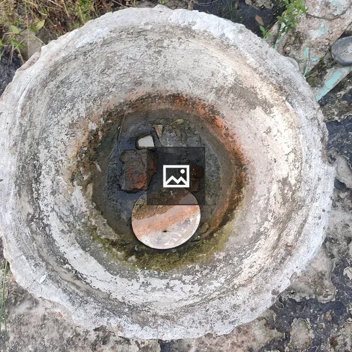 Round cement pit with water