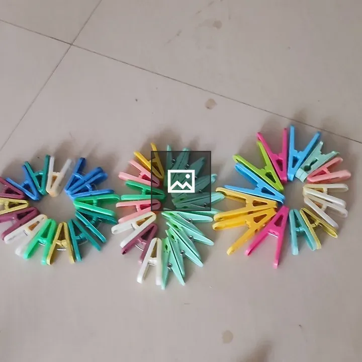 Colourful cloth clips in circle