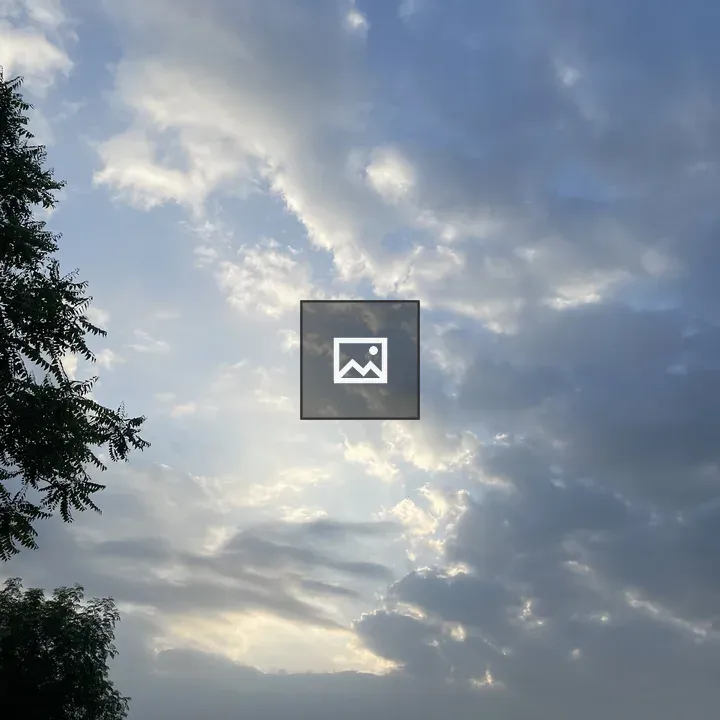 Partly cloudy sky over nature scene