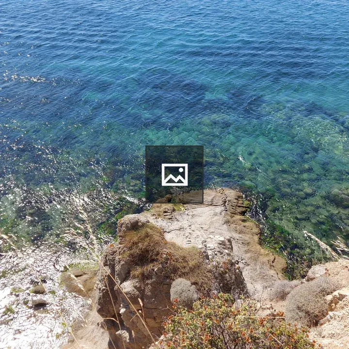 Coastline with Blue Water and Rocks