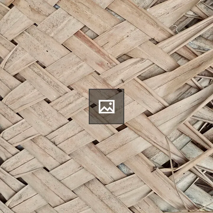 Woven coconut palm leaves close-up