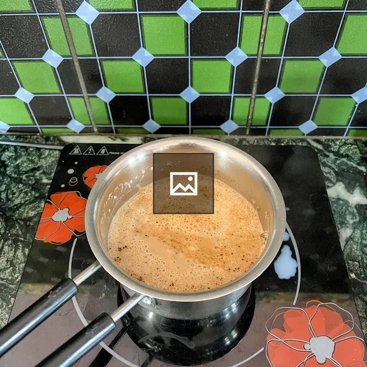 Pot of chai tea on stove