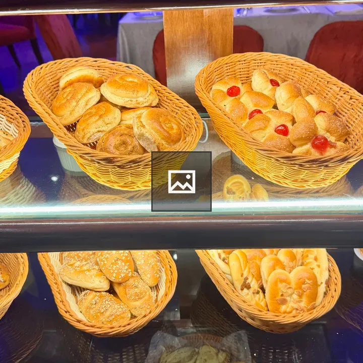Bread Rolls on Bakery Shelf
