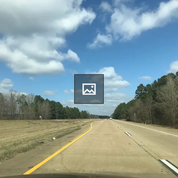 Highway with Trees and Clouds