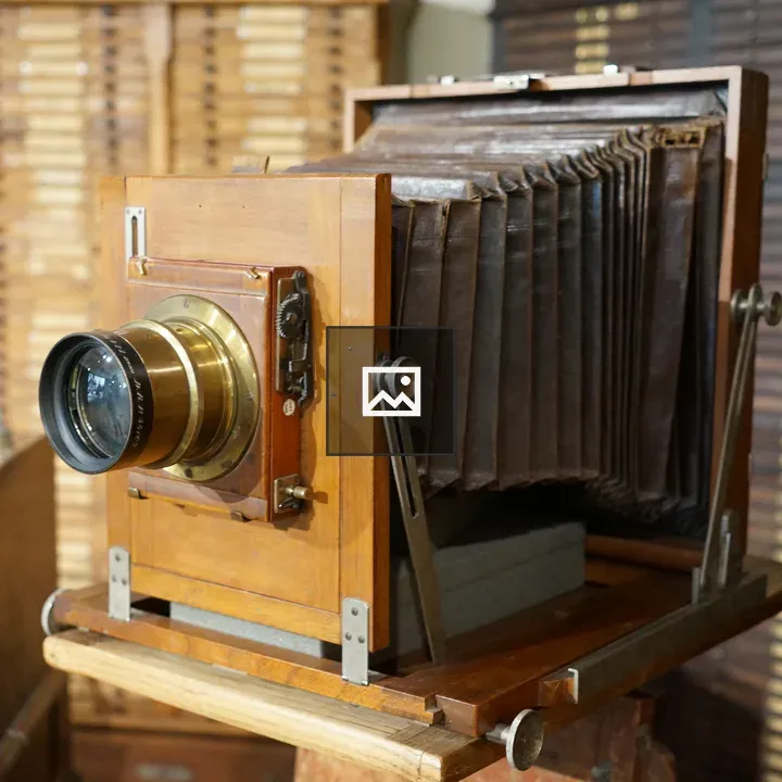 Wooden camera with brass lens