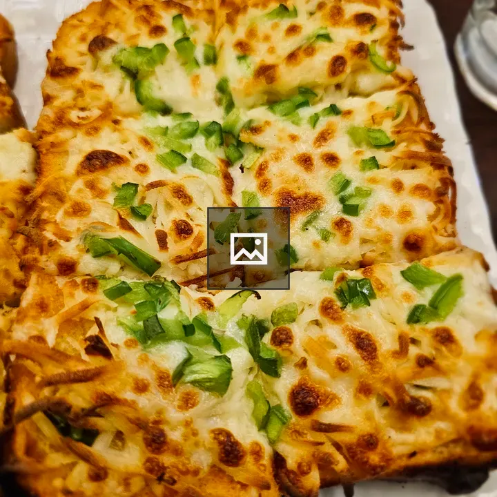 Garlic bread with cheese and peppers
