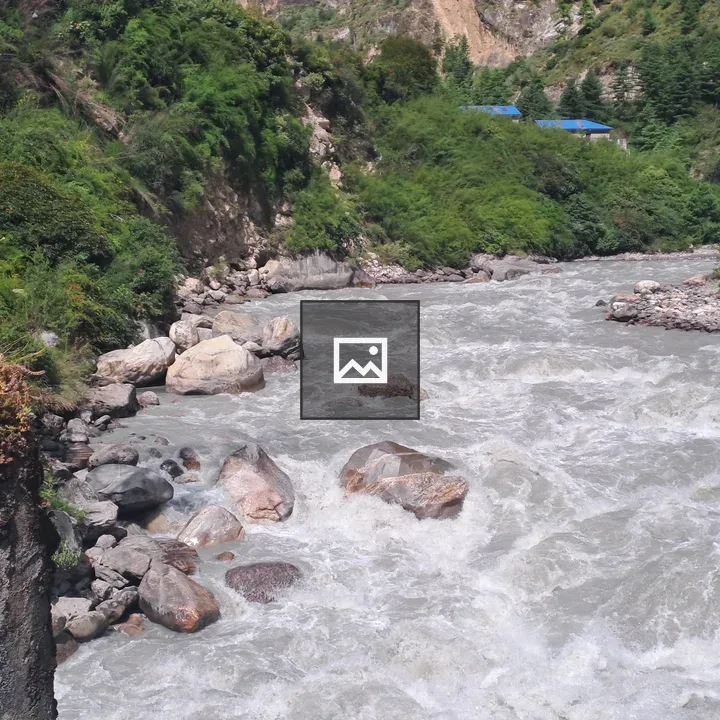 Rushing River Through Rocky Landscape