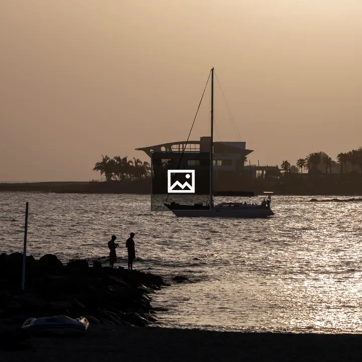 Sunset at Playa de Las Vistas with Sailboat