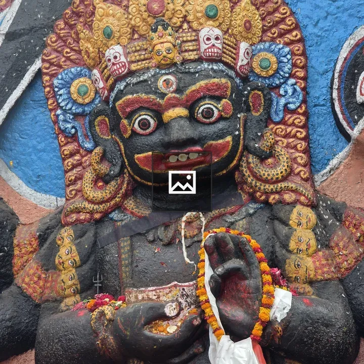 Statue with gold and blue decorations