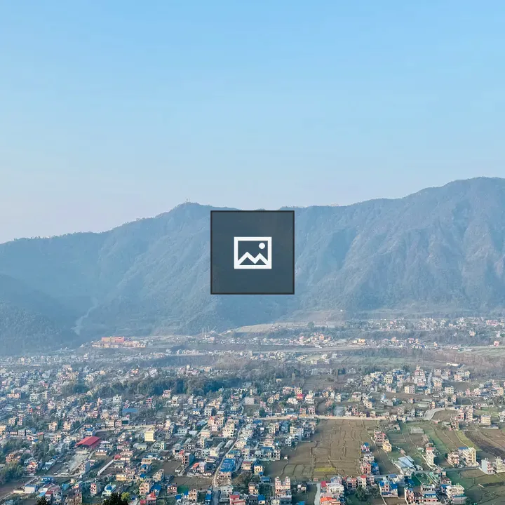 Cityscape Over Valley and Hills