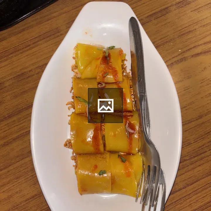 Cheese Pieces with Basil Garnish