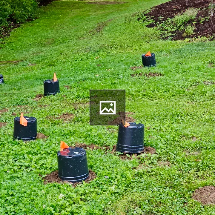 Black Buckets with Orange Flags