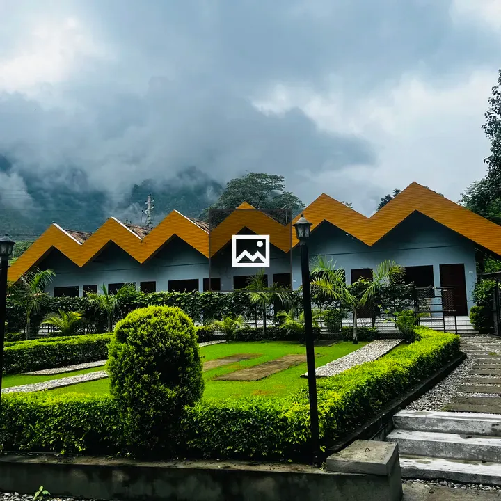 Row of yellow zigzag roofs