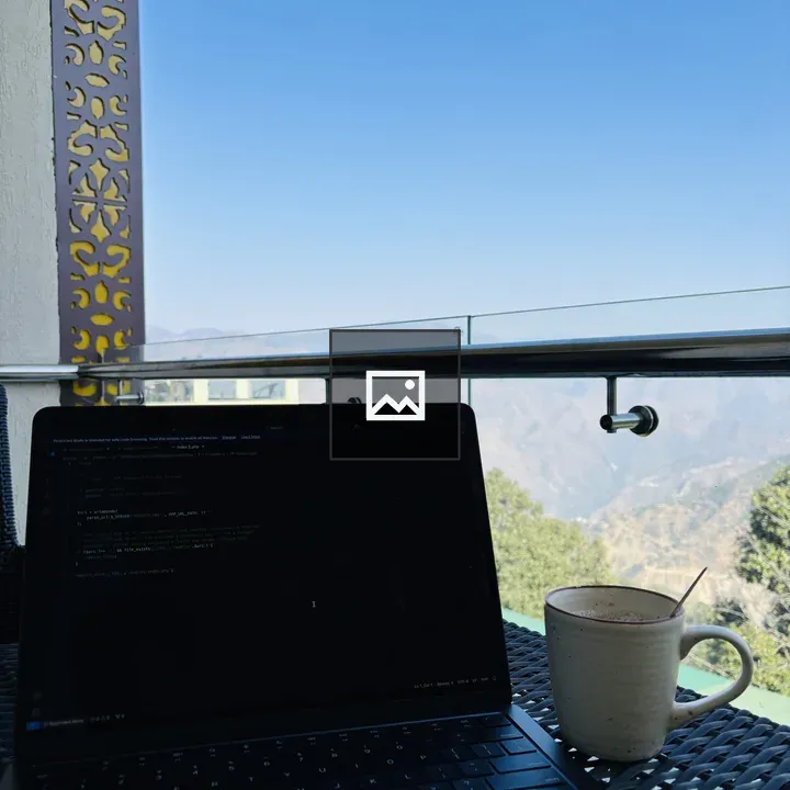 Laptop with code on outdoor table