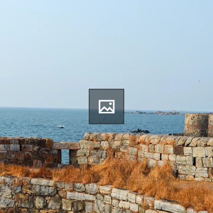 Rocky coastal landscape with stone walls