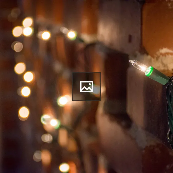 Small Christmas Light on Brick Wall