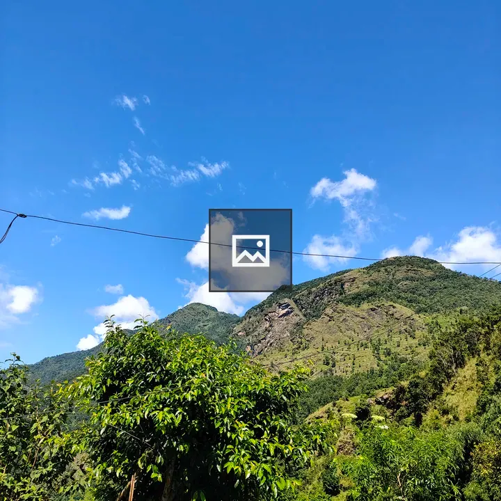 Green mountains with blue sky