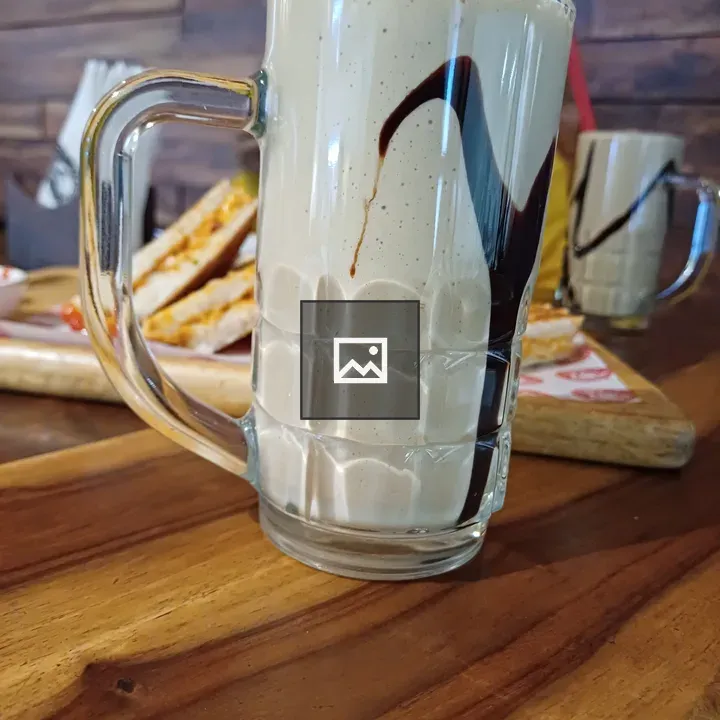 Cold coffee drink with a straw