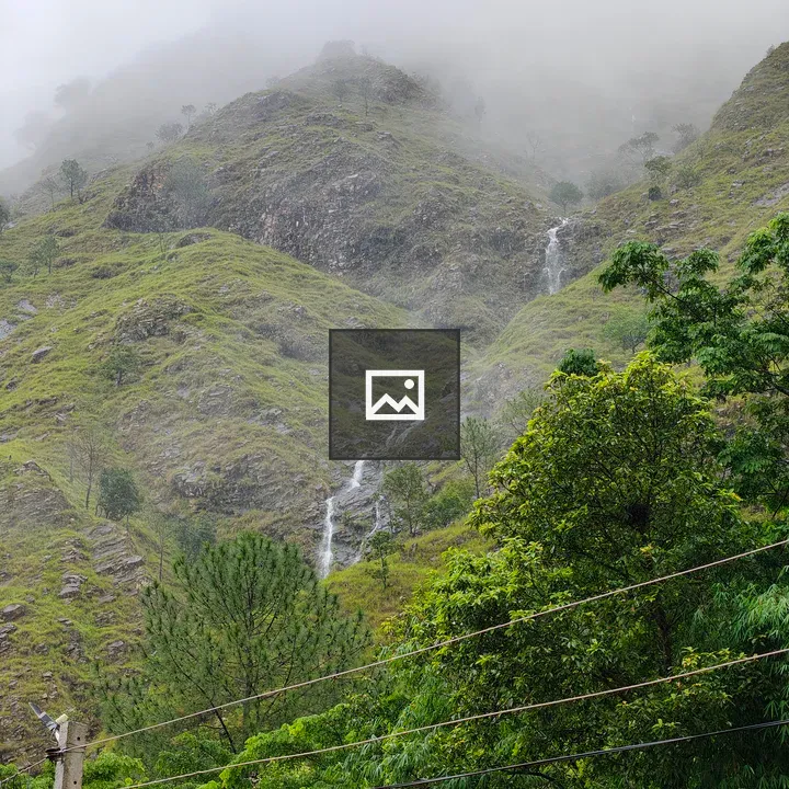 Mist-shrouded mountain landscape