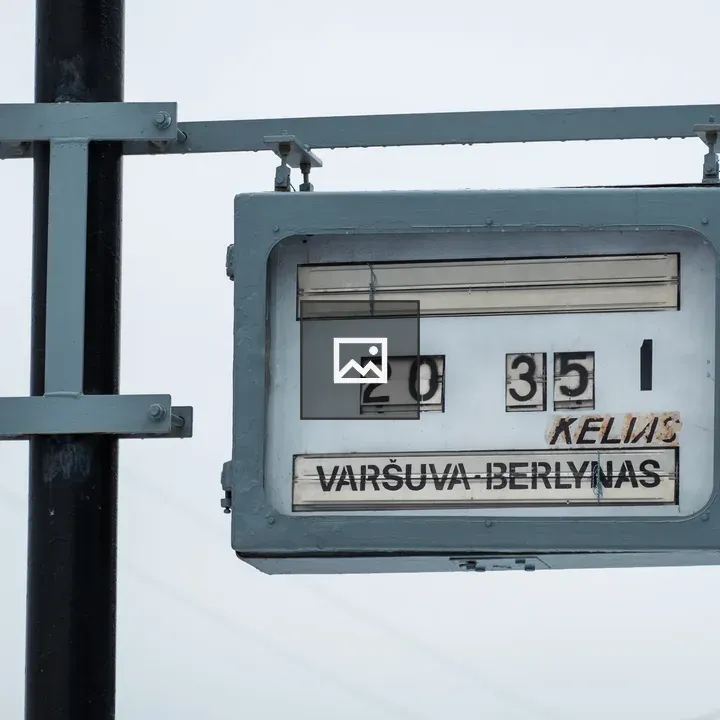 Vintage departure board on a pole