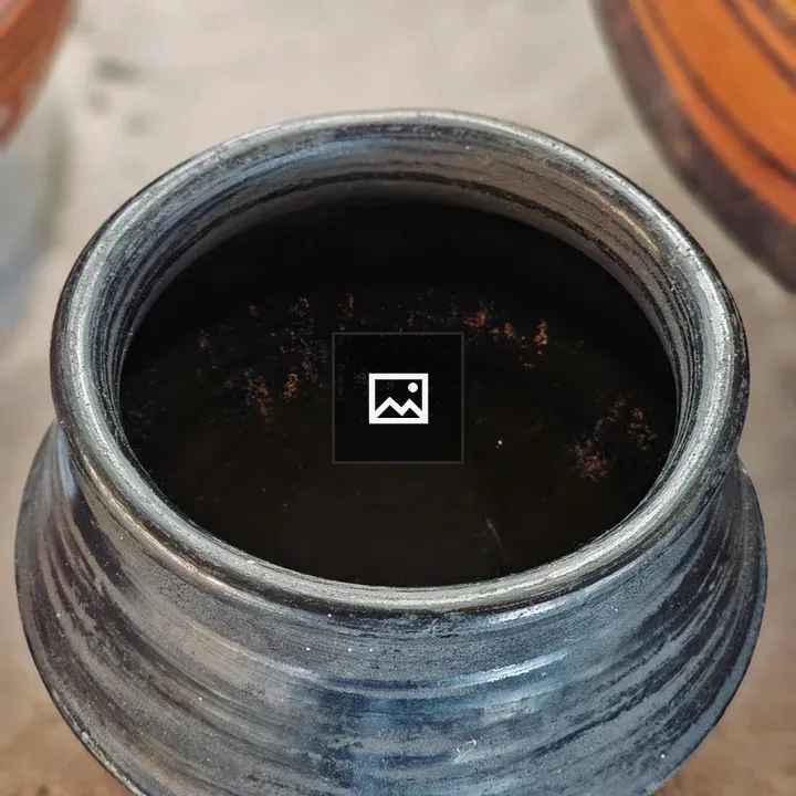 Handmade black earthen pot