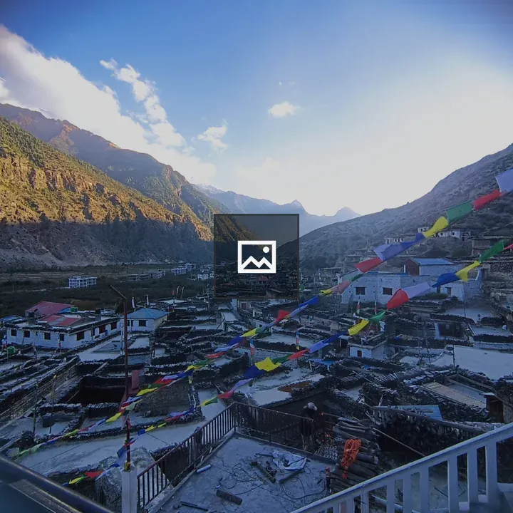 Mountain village with prayer flags