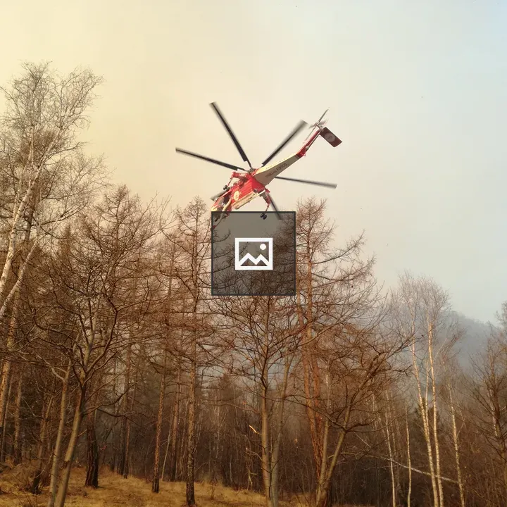 Helicopter over forest