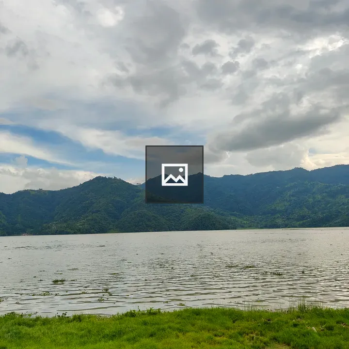 Serene lake landscape with hills