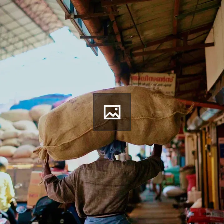 Hardworking man with sack on head