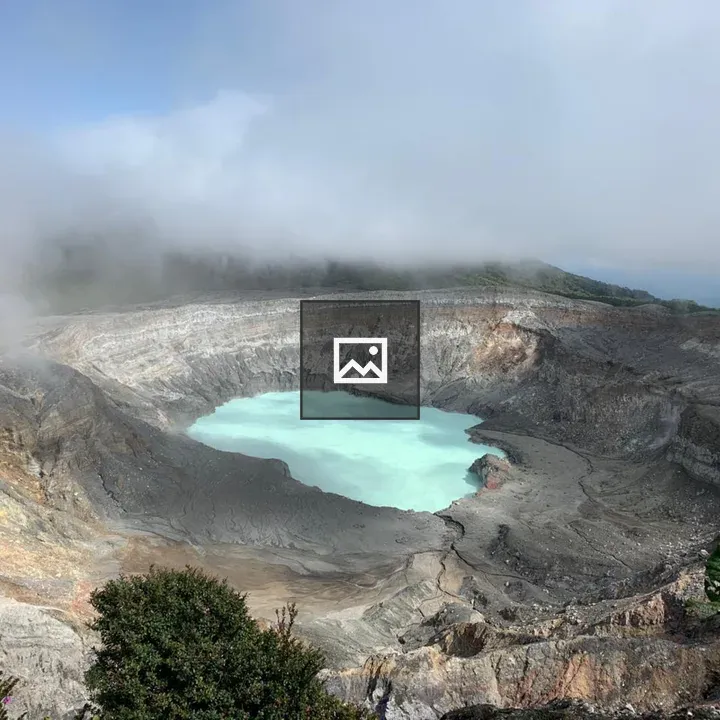 Volcanic crater with blue lake