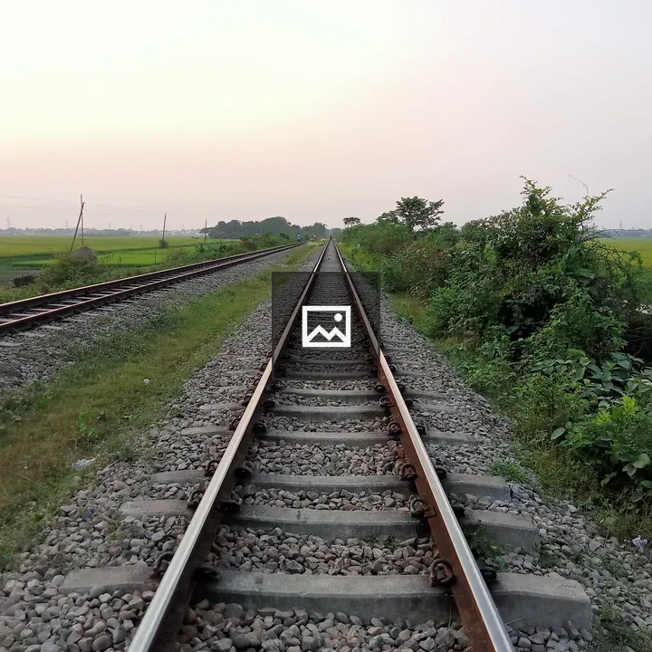 Railway tracks through countryside