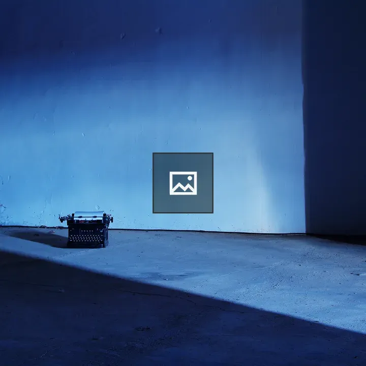 Antique typewriter in blue tones