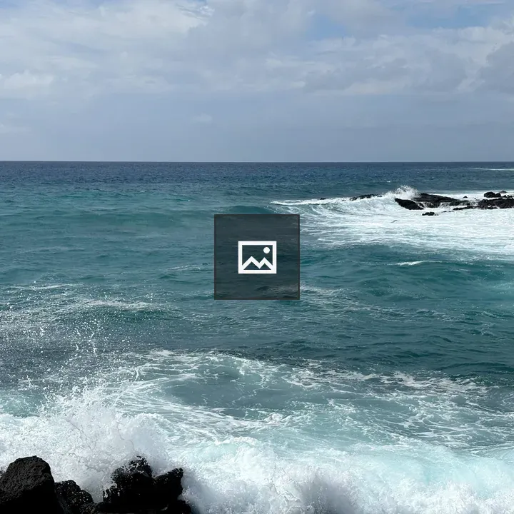 Blue waves on lava rocks