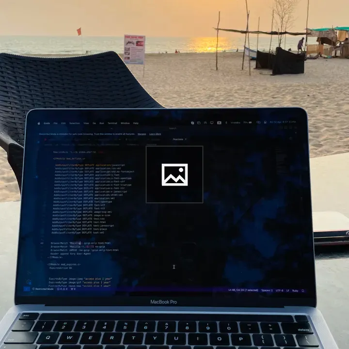 Laptop on Beach at Sunset