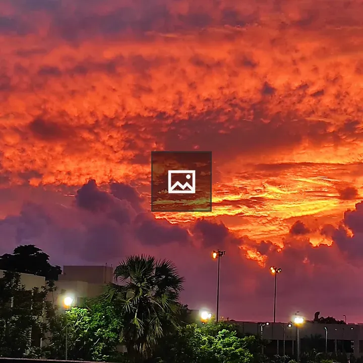 Sunset with silhouettes and clouds