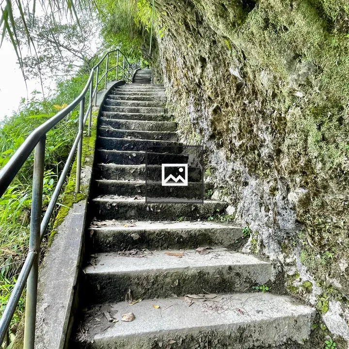 Narrow stone staircase along cliff