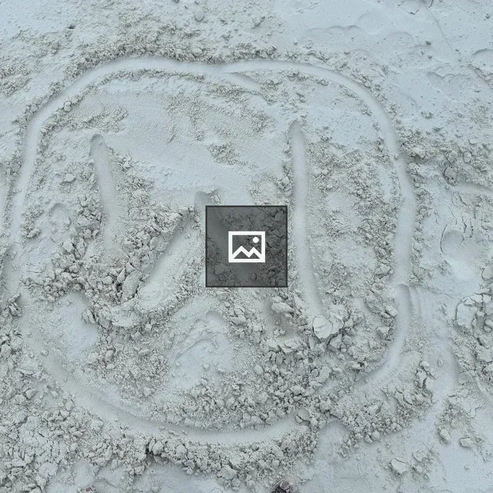 WordPress W Logo on Sand