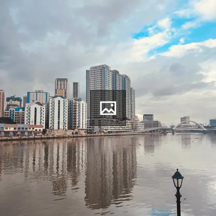 Pasig River and City Skyline