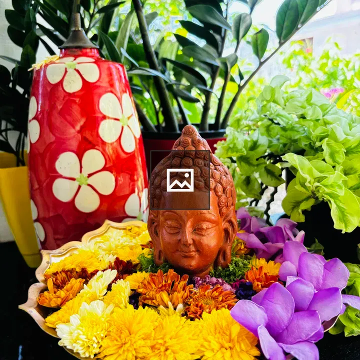 Head of the Buddha in Flowers